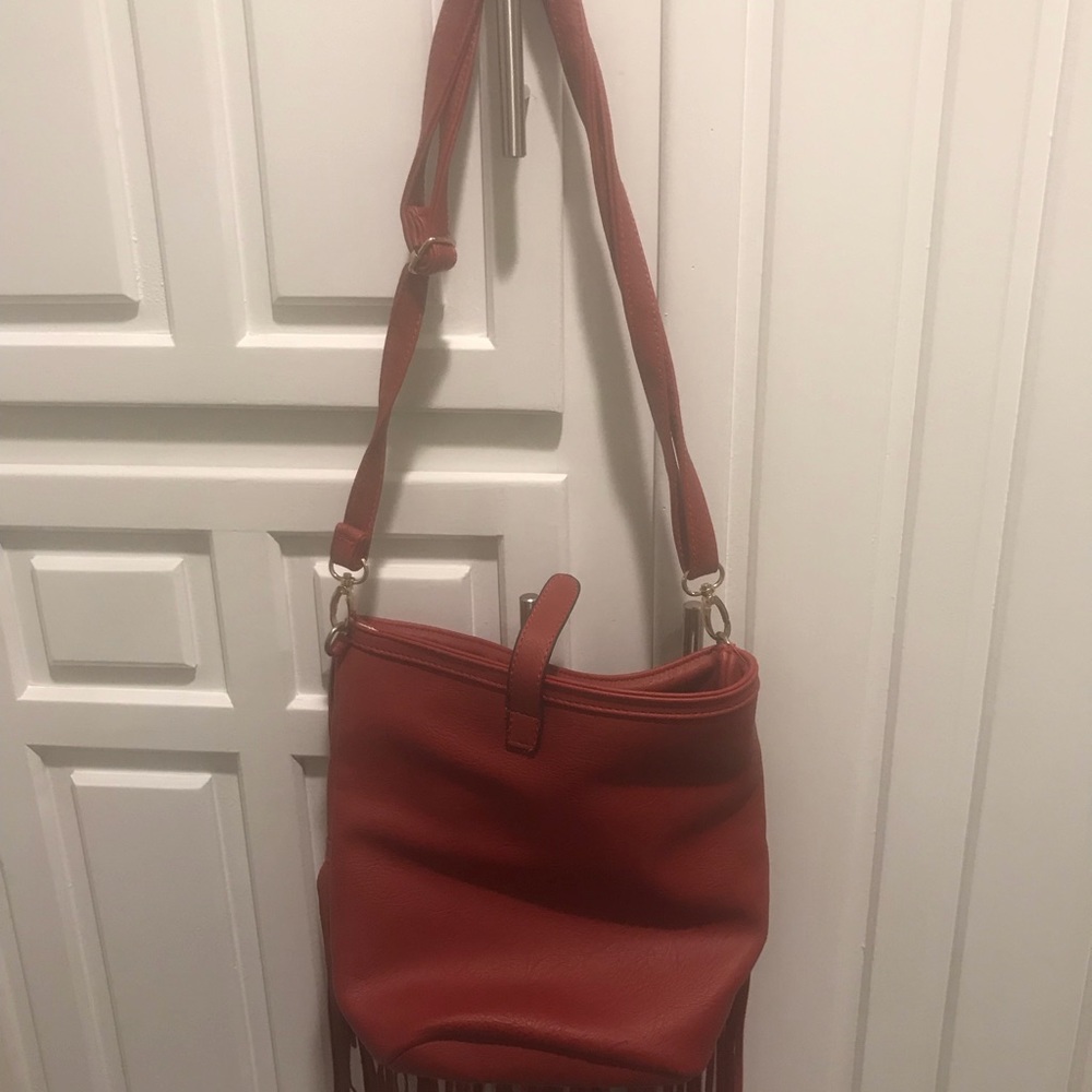Faux red leather fringe purse